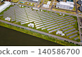 [Aerial view] Mega solar power plant, renewable energy infrastructure facility 140586700