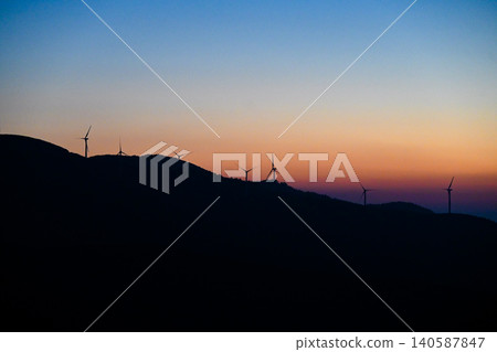 Windmills and the gradient of the rising sun Windmills and the gradient of the rising sun 140587847