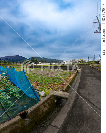 A peaceful rural landscape and beautiful stream scenery in early summer, Niihama City, Ehime Prefecture A peaceful rural landscape and beautiful stream scenery in early summer, Niihama City, Ehime Prefecture 140587909