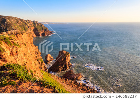 View of the Atlantic Ocean from Cabo da Roca. Cabo da Roca or Cape Roca is westernmost cape of mainland Portugal, continental Europe and the Eurasian land mass View of the Atlantic Ocean from Cabo da Roca. Cabo da Roca or Cape Roca is westernmost cape of mainland Portugal, continental Europe and the Eurasian land mass 140588237