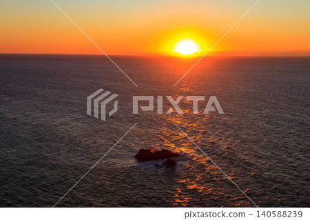 View of the Atlantic Ocean from Cabo da Roca at sunset. Cabo da Roca or Cape Roca is westernmost cape of mainland Portugal, continental Europe and the Eurasian land mass 140588239