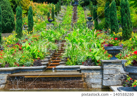 Italian flower water stairs on the island of flowers Mainau on Lake Constance, Germany Italian flower water stairs on the island of flowers Mainau on Lake Constance, Germany 140588280