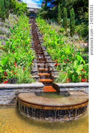 Italian flower water stairs on the island of flowers Mainau on Lake Constance, Germany Italian flower water stairs on the island of flowers Mainau on Lake Constance, Germany 140588281