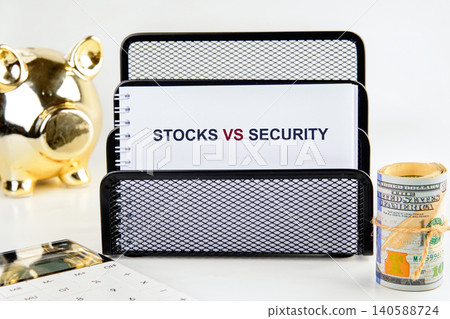A detailed exploration of stocks versus security is displayed on a notepad, accompanied by a golden piggy bank and a calculator, symbolizing financial decisions A detailed exploration of stocks versus security is displayed on a notepad, accompanied by a golden piggy bank and a calculator, symbolizing financial decisions 140588724