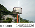 A train station overlooking the sea; the scenery reflected in the mirror. 140588826