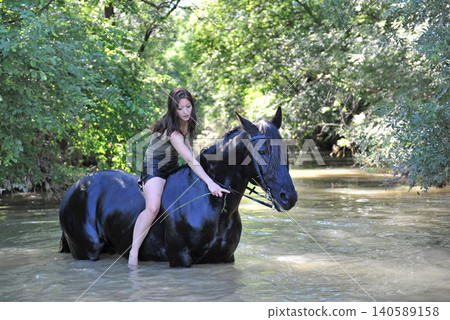 riding girl and horse in river riding girl and horse in river 140589158