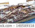 Pillars of a house damaged by termites 140589318