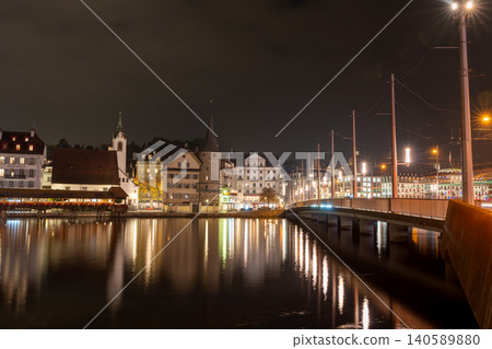A view of the Reuss River and the illuminated old town from the See Bridge. Lucerne, Canton of Lucerne, Switzerland A view of the Reuss River and the illuminated old town from the See Bridge. Lucerne, Canton of Lucerne, Switzerland 140589880