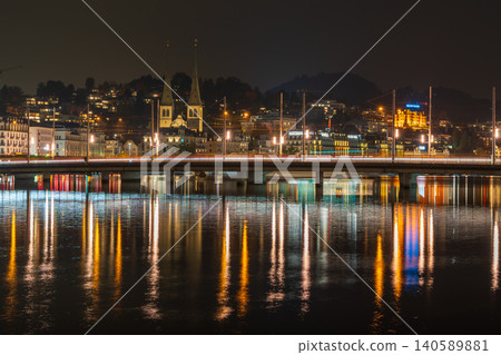 A nighttime view of traffic on the See Bridge over the Reuss River and the architecture of the old town. Lucerne, Canton of Lucerne, Switzerland 140589881