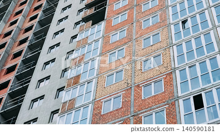 New house construction.Multi storey building.Residential multi apartment 140590181