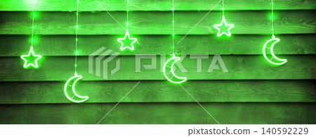 Bright glowing Xmas decoration. Stars and moon Bright glowing Xmas decoration. Stars and moon 140592229