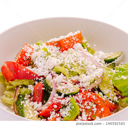 Fresh greek salad with feta cheese and vegetables Fresh greek salad with feta cheese and vegetables 140592583