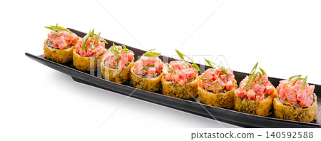 Fried sushi rolls with spicy tuna tartare topping 140592588