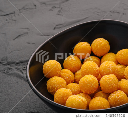 Golden crunchy cheese balls serving as appetizers Golden crunchy cheese balls serving as appetizers 140592628