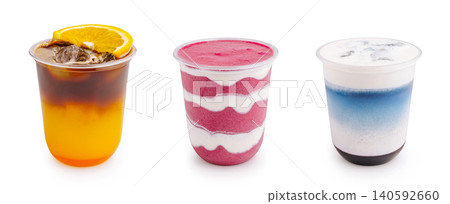Refreshing summer drinks in plastic cups on white background Refreshing summer drinks in plastic cups on white background 140592660