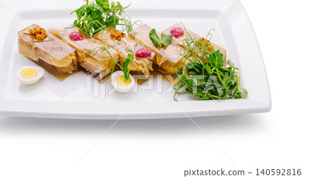Aspic terrine with jellied meat, mustard, and quail egg Aspic terrine with jellied meat, mustard, and quail egg 140592816