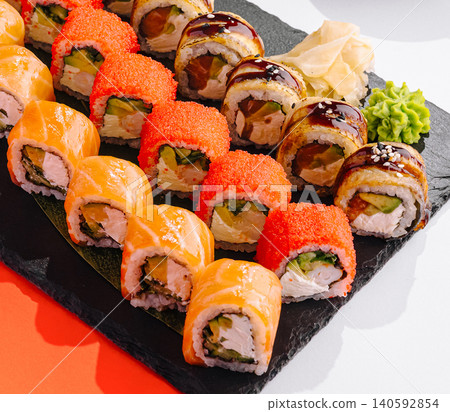 Uramaki sushi rolls set with salmon and eel 140592854