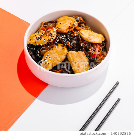 Asian chicken stir-fry noodles with wood ear mushrooms Asian chicken stir-fry noodles with wood ear mushrooms 140592856