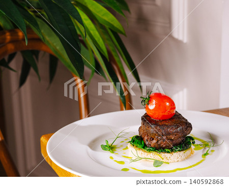 Gourmet steak fillet with spinach and cherry tomato Gourmet steak fillet with spinach and cherry tomato 140592868