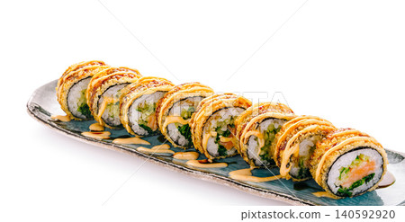 Fried crunchy tempura maki sushi rolls with sauce Fried crunchy tempura maki sushi rolls with sauce 140592920