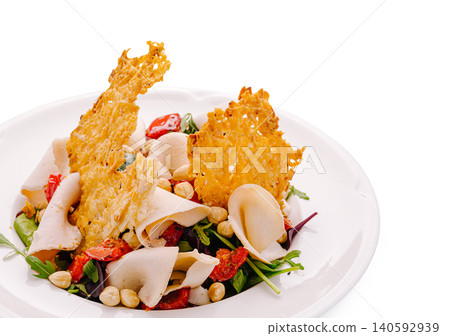 Gourmet salad with parmesan crisps and sun-dried tomatoes Gourmet salad with parmesan crisps and sun-dried tomatoes 140592939