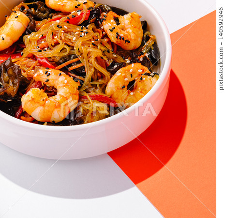 Shrimp glass noodles stir-fry bowl with sesame seeds Shrimp glass noodles stir-fry bowl with sesame seeds 140592946