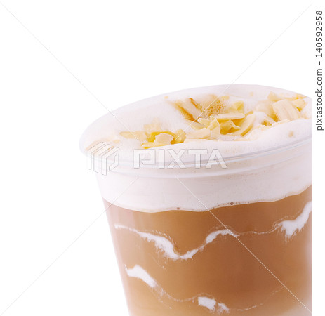 Coffee latte drink with almond flakes and foam 140592958