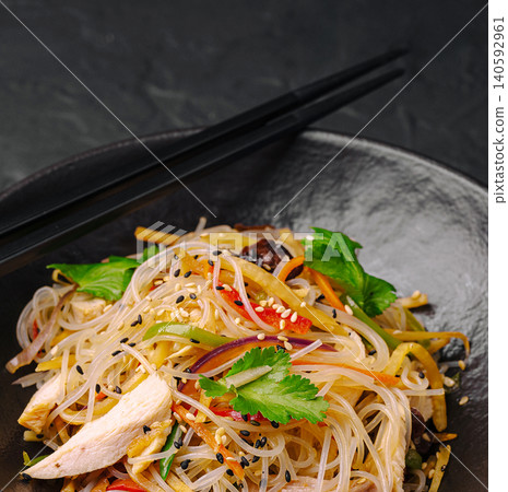 Glass noodles salad with chicken and vegetables Glass noodles salad with chicken and vegetables 140592961
