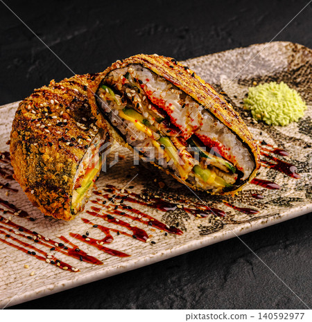 Deep-fried tempura sushi burrito fusion japanese food Deep-fried tempura sushi burrito fusion japanese food 140592977