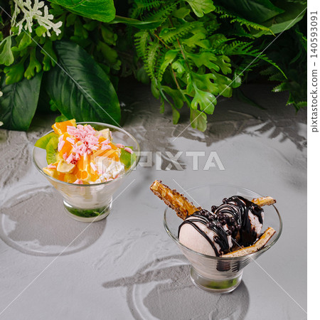 Assorted ice cream sundaes with gourmet toppings Assorted ice cream sundaes with gourmet toppings 140593091