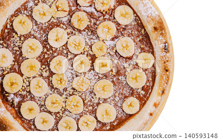 Delicious dessert pizza with chocolate, bananas, and nuts Delicious dessert pizza with chocolate, bananas, and nuts 140593148