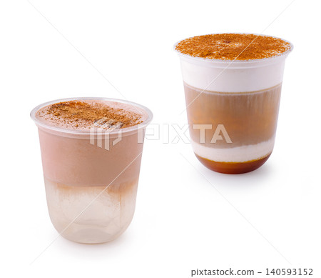 Two assorted iced espresso lattes with powder Two assorted iced espresso lattes with powder 140593152