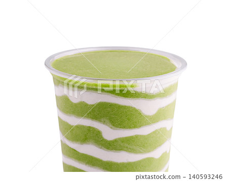 Layered green matcha smoothie with yogurt cream Layered green matcha smoothie with yogurt cream 140593246