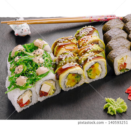 Assorted vegan sushi rolls set on slate 140593251