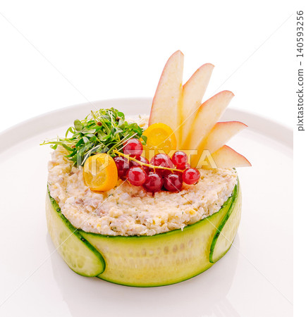 Gourmet Olivier salad decorated with fresh berries Gourmet Olivier salad decorated with fresh berries 140593256