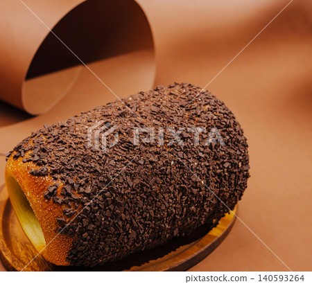 Traditional chimney cake with chocolate sprinkles Traditional chimney cake with chocolate sprinkles 140593264