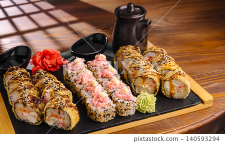 Assorted sushi set with fried tempura rolls Assorted sushi set with fried tempura rolls 140593294