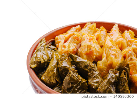 Traditional sarmale and dolma in clay bowl Traditional sarmale and dolma in clay bowl 140593300