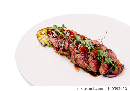 Sliced roasted duck breast with sweet sauce Sliced roasted duck breast with sweet sauce 140593420
