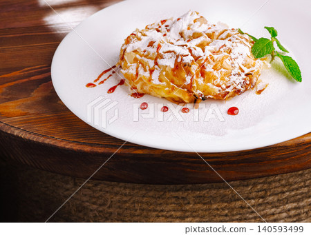 Crispy Apple Strudel With Powdered Sugar Coating Crispy Apple Strudel With Powdered Sugar Coating 140593499