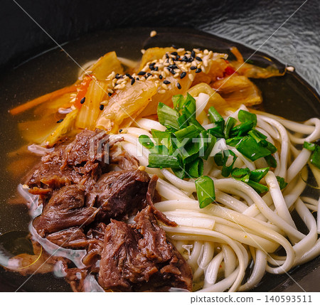 Closeup Of Asian Beef Noodle Soup With Kimchi Closeup Of Asian Beef Noodle Soup With Kimchi 140593511