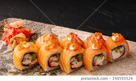 Philadelphia Sushi Rolls With Red Salmon Caviar Topping Philadelphia Sushi Rolls With Red Salmon Caviar Topping 140593524