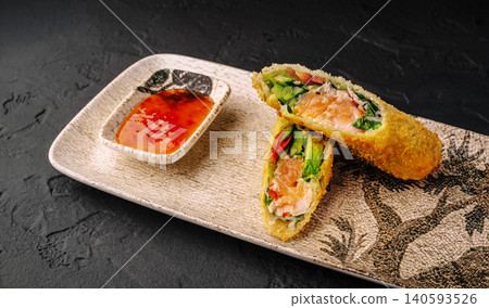 Crispy Deep Fried Spring Rolls With Sweet Chili Sauce 140593526