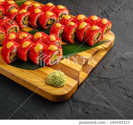 Large California Sushi Roll Combo Set On Wooden Platter Large California Sushi Roll Combo Set On Wooden Platter 140593527