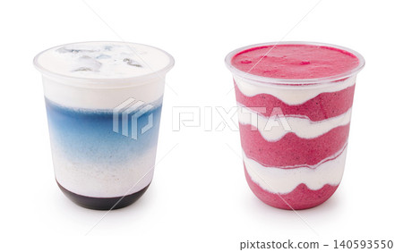 Two refreshing iced summer drinks in cups Two refreshing iced summer drinks in cups 140593550