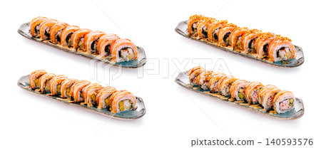 Assorted Sushi Rolls Set On Ceramic Plates Assorted Sushi Rolls Set On Ceramic Plates 140593576