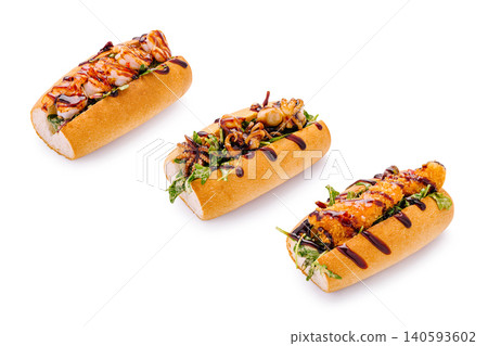 Sushi rolls with seafood topping and garnishes on a plate in a restaurant 140593602
