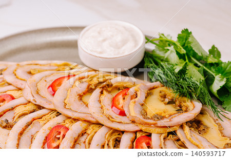 Sliced Roasted Meat Roll Appetizer With Sauce Sliced Roasted Meat Roll Appetizer With Sauce 140593717