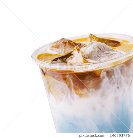 Iced Blue Matcha Espresso Latte Close Up Iced Blue Matcha Espresso Latte Close Up 140593776