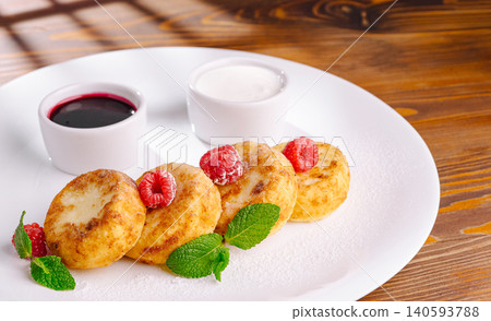 Cottage Cheese Pancakes With Fresh Raspberries Inside Cottage Cheese Pancakes With Fresh Raspberries Inside 140593788